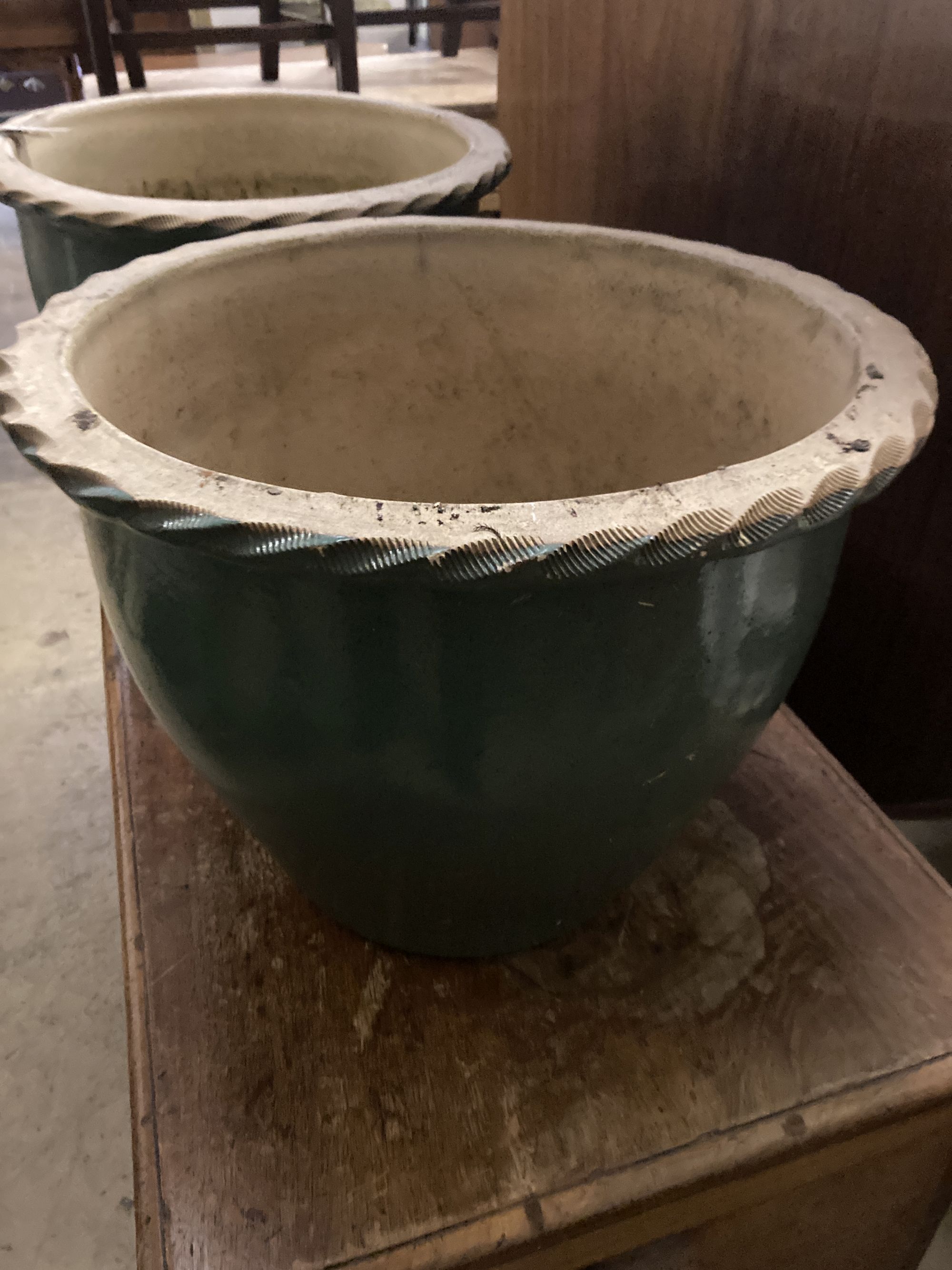 A pair of circular glazed earthenware garden planters, 48cm diameter, height 36cm